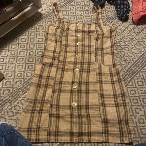 a cute tan brown cross stripped dress